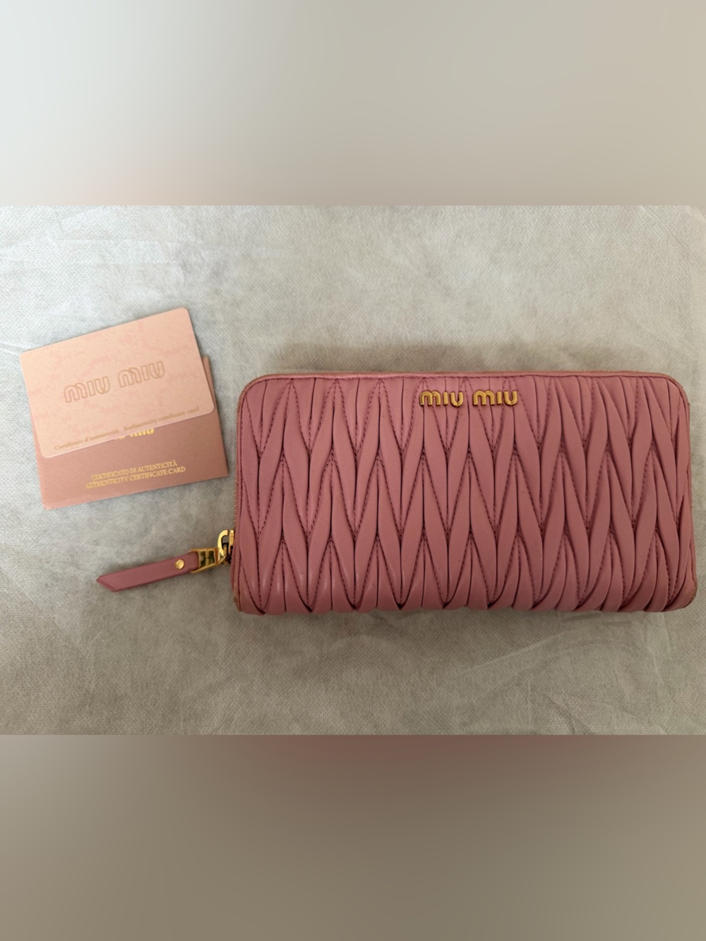 Miu Miu Pink Matelassé Zip Around Wallet with Gold Logo